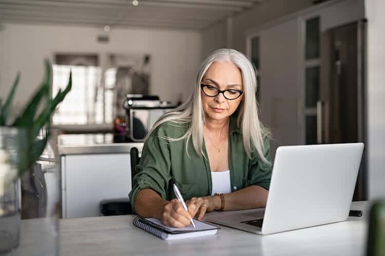 Senior woman finding ways to save money for retirement.