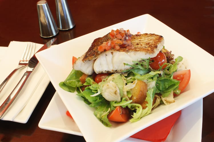 Healthy fish dinner salad.