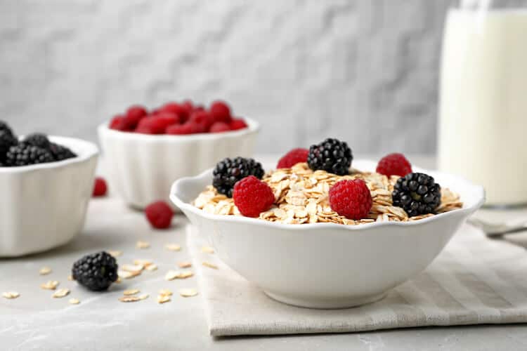 Breakfast bowl with oatmeal, blackberries and raspberries.