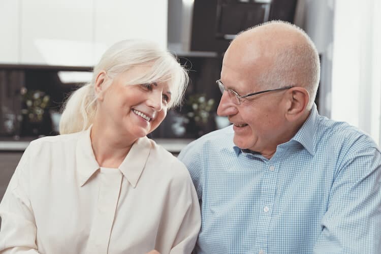 Senior couple enjoying their apartment in a CCRC.