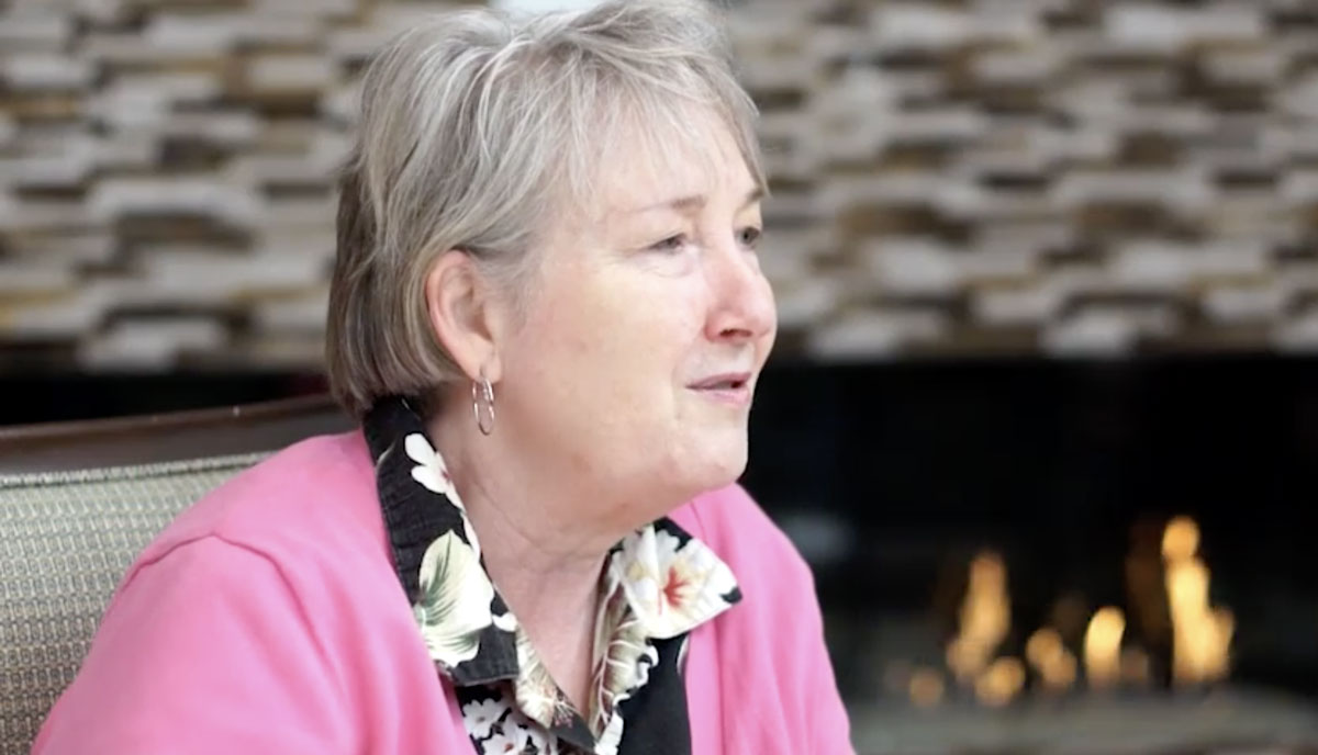 woman in pink sweater