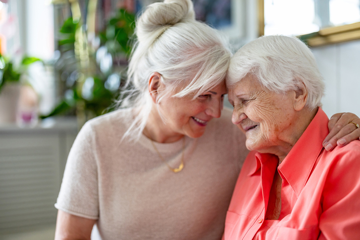 senior woman with adult child