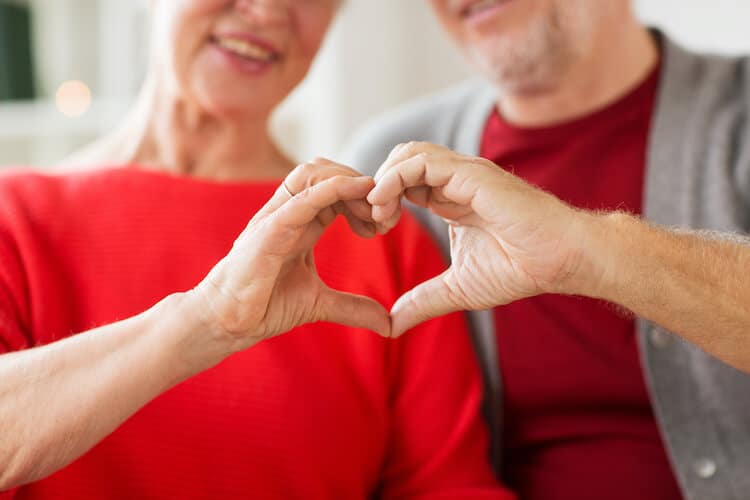 Senior couple celebrating American Heart Month.