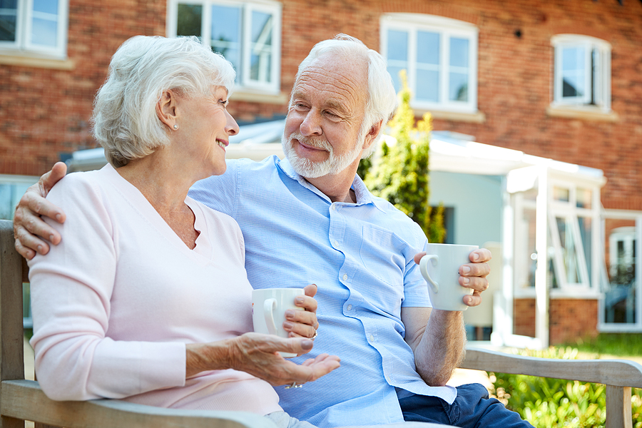 A senior couple discusses assisted living questions